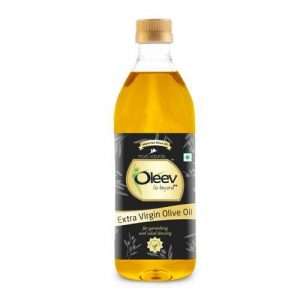 40007327 13 oleev extra virgin olive oil garnishing salad dressing