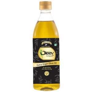 40007333 13 oleev extra virgin olive oil garnishing salad dressing